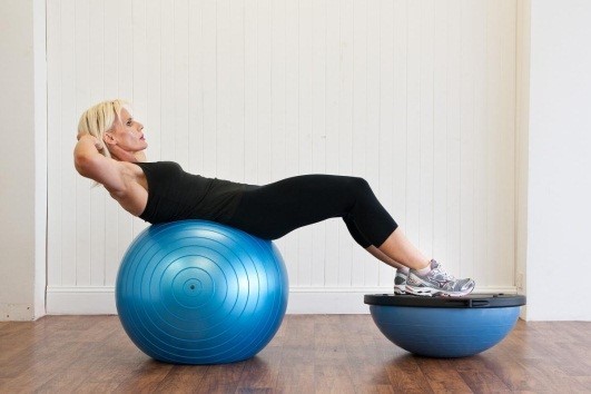 Try a bosu or balance ball to spicen up your next workout